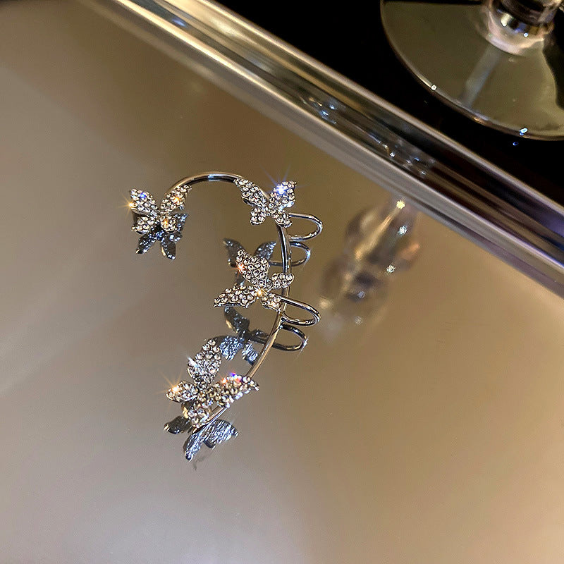Valantomode | Plated Sculptural Butterfly Earrings with High-Refractive Stone Assets
