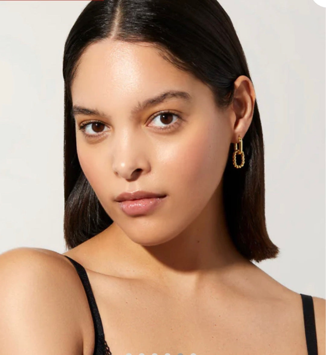 Valantomode | Plated Lauren Drop Hoop Earrings with Helical Torsion Architecture and Oval Geometry