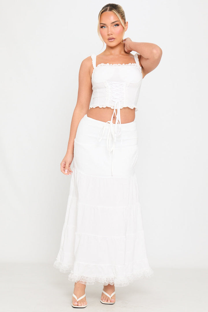 Valantomode | Elegant White Tiered Maxi Skirt with Ruffle Tie Detail