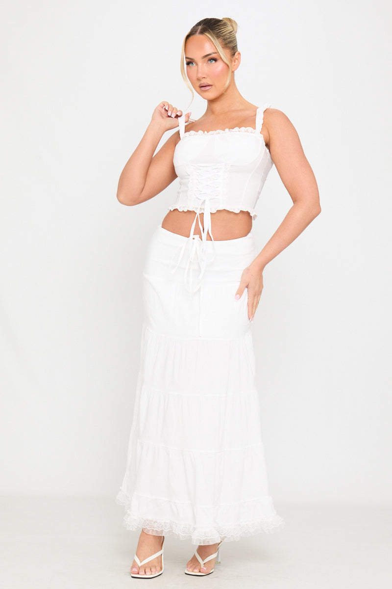 Valantomode | Elegant White Tiered Maxi Skirt with Ruffle Tie Detail