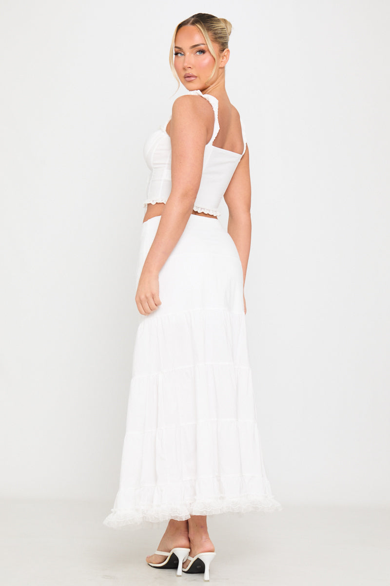 Valantomode | Elegant White Tiered Maxi Skirt with Ruffle Tie Detail