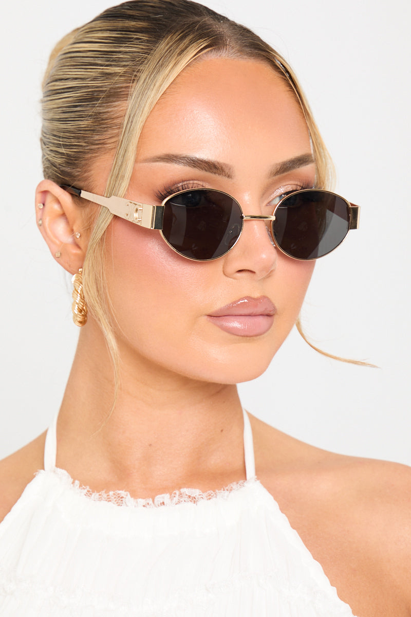 Valantomode | Chic Gold & Black Oval Frame Sunglasses for Trendsetters
