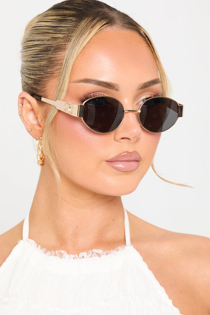 Valantomode | Chic Gold & Black Oval Frame Sunglasses for Trendsetters