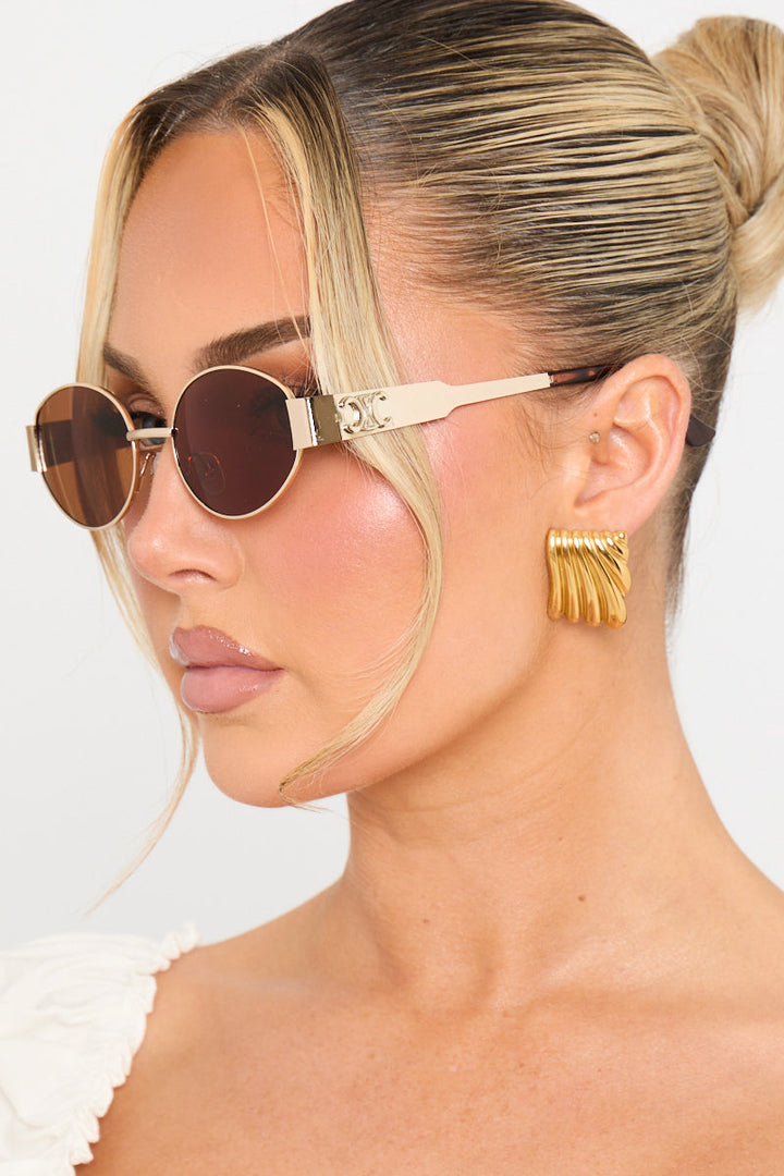 Valantomode | Chic Gold Brown Oval Frame Sunglasses for Stylish Vision