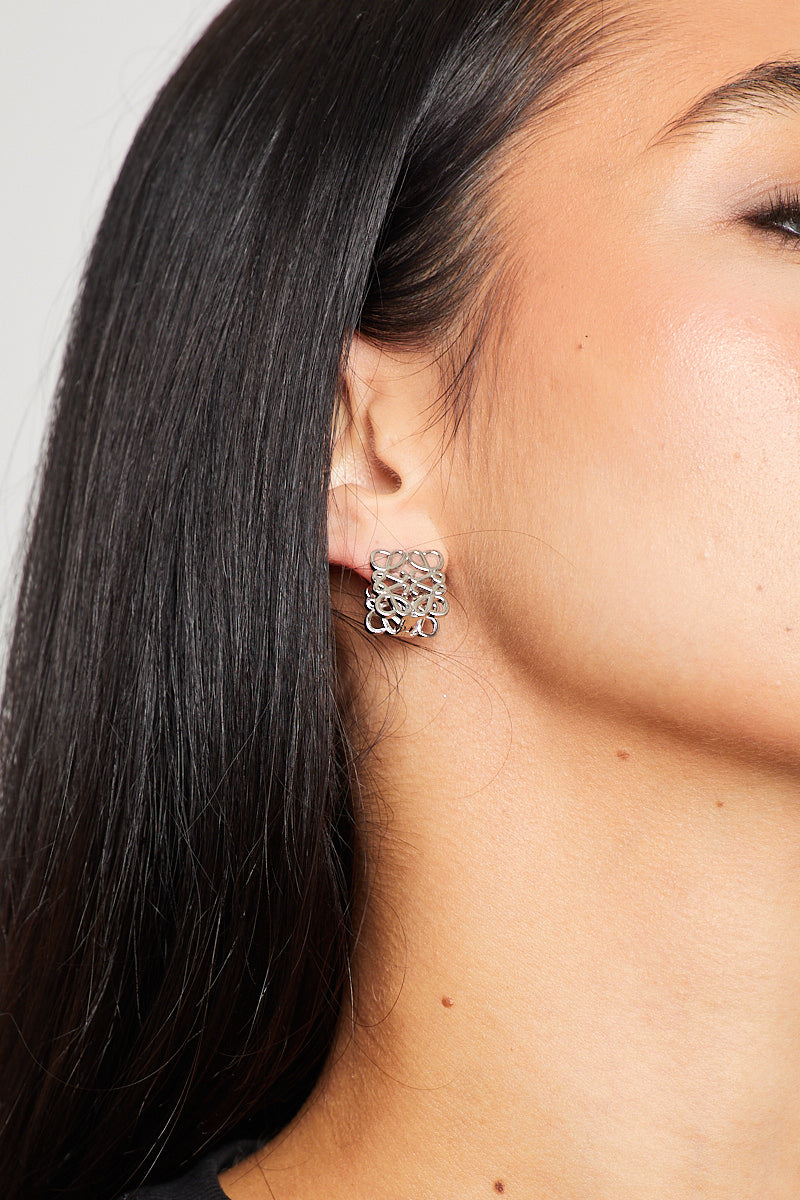 Valantomode | Elegant Silver Anagram Stud Earrings for Chic Style