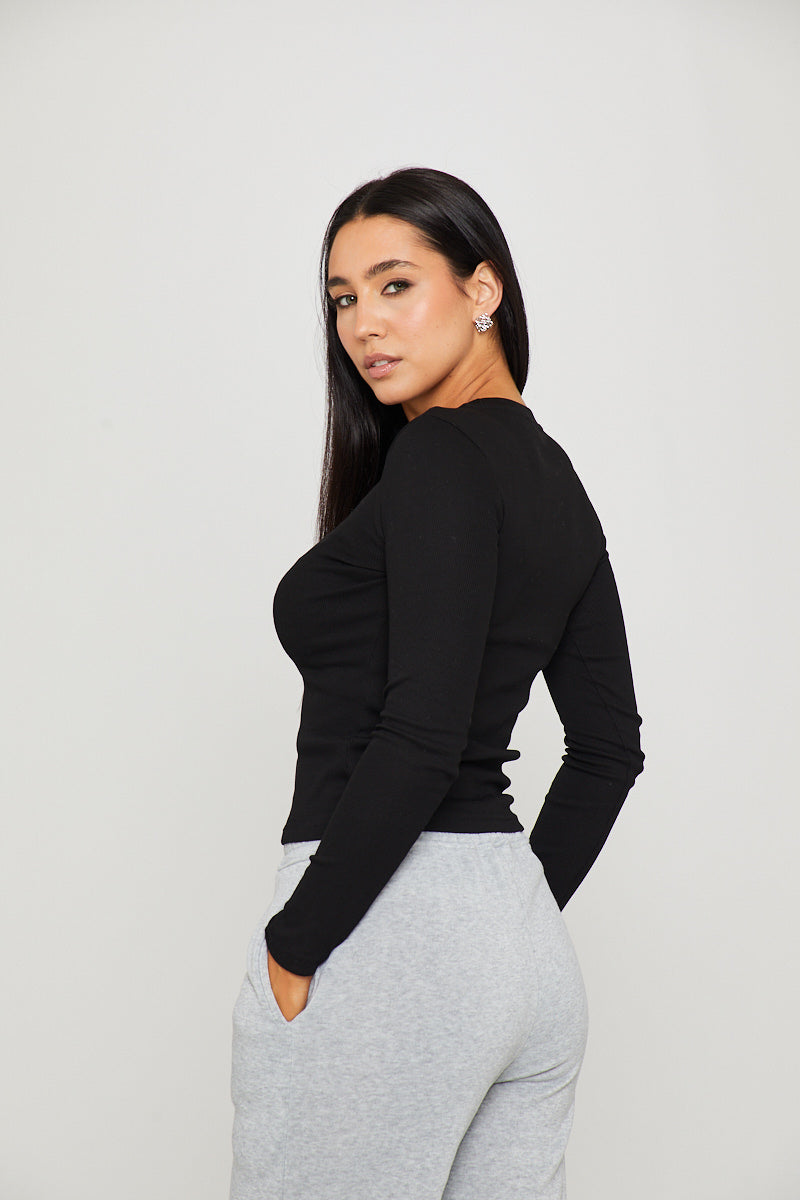Valantomode | Stylish Black Ribbed Long Sleeve Top with Anagram Embroidery