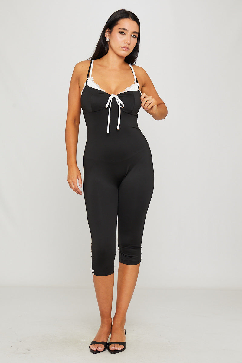 Valantomode | Chic Black Ribbed Tie-Front Capri Jumpsuit for Effortless Style