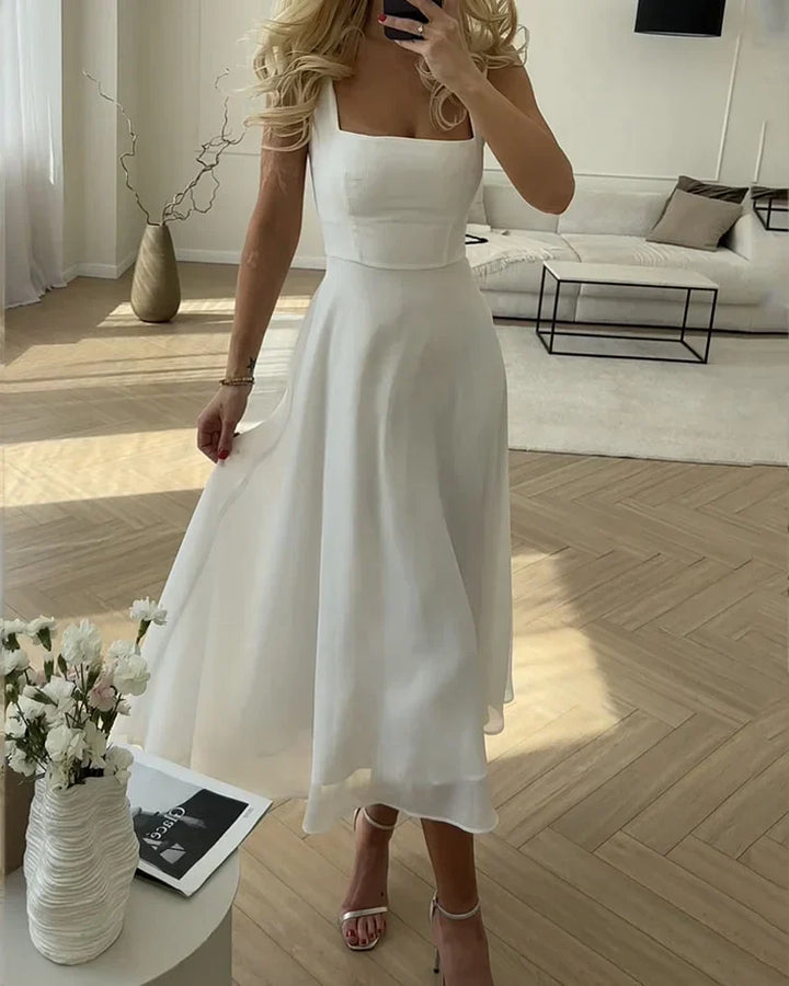 Valantomode | Elegant Midi Dress with Sheer Ruffle Hem Detail