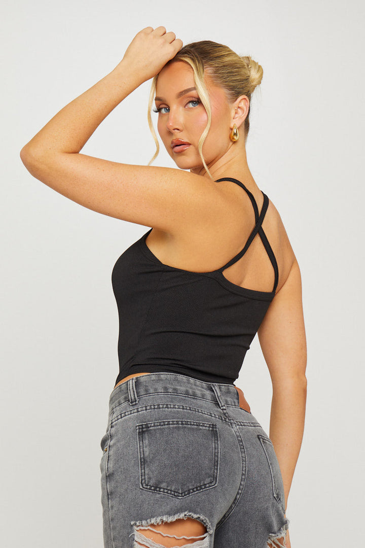 Valantomode | Sleek Black Ribbed Plunge High Leg Bodysuit for Chic Style