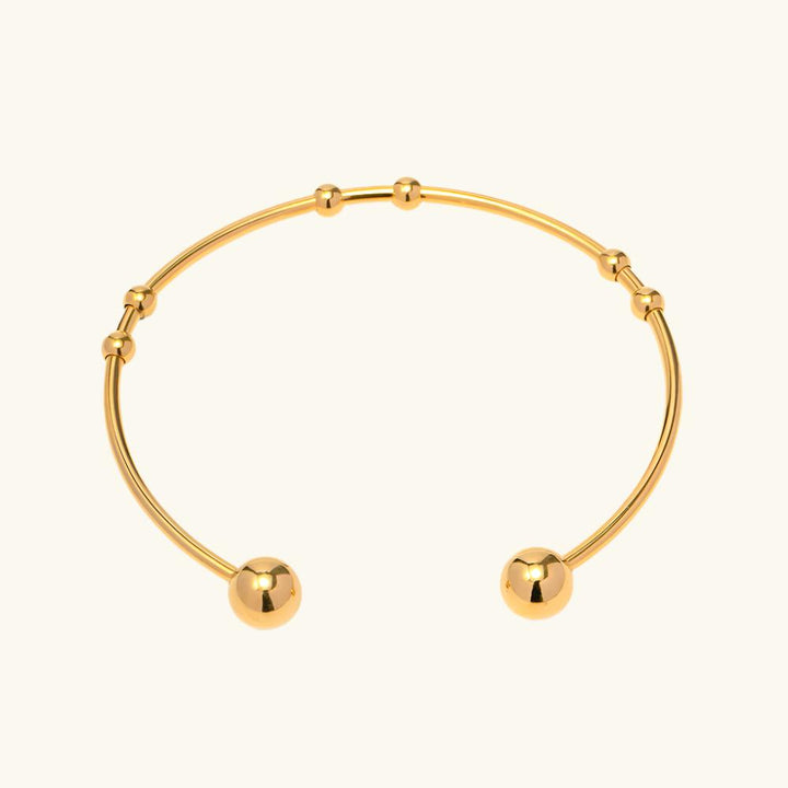 Valantomode | Plated Camille Bangle with Spherical Focal Assets and Monolithic Architecture