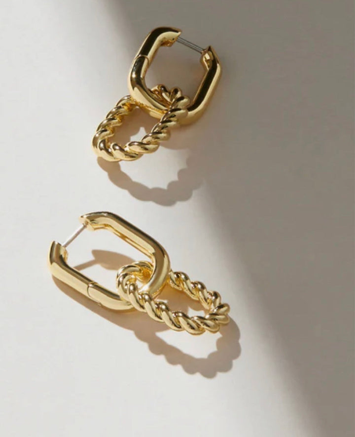 Valantomode | Plated Lauren Drop Hoop Earrings with Helical Torsion Architecture and Oval Geometry