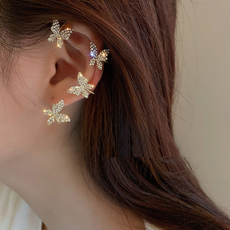 Valantomode | Plated Sculptural Butterfly Earrings with High-Refractive Stone Assets