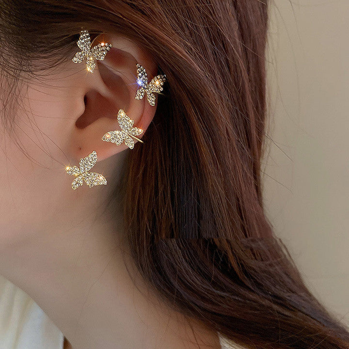 Valantomode | Plated Sculptural Butterfly Earrings with High-Refractive Stone Assets