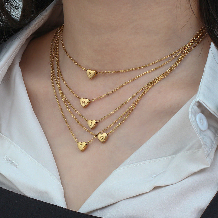 Valantomode | Plated Heart Muse Initial Necklace with Alphanumeric Cordiform Architecture