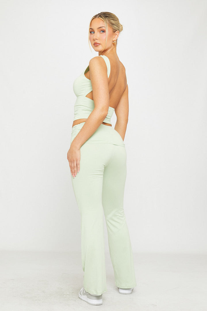 Valantomode | Light Sage Backless Crop Top & Flared Leggings Set