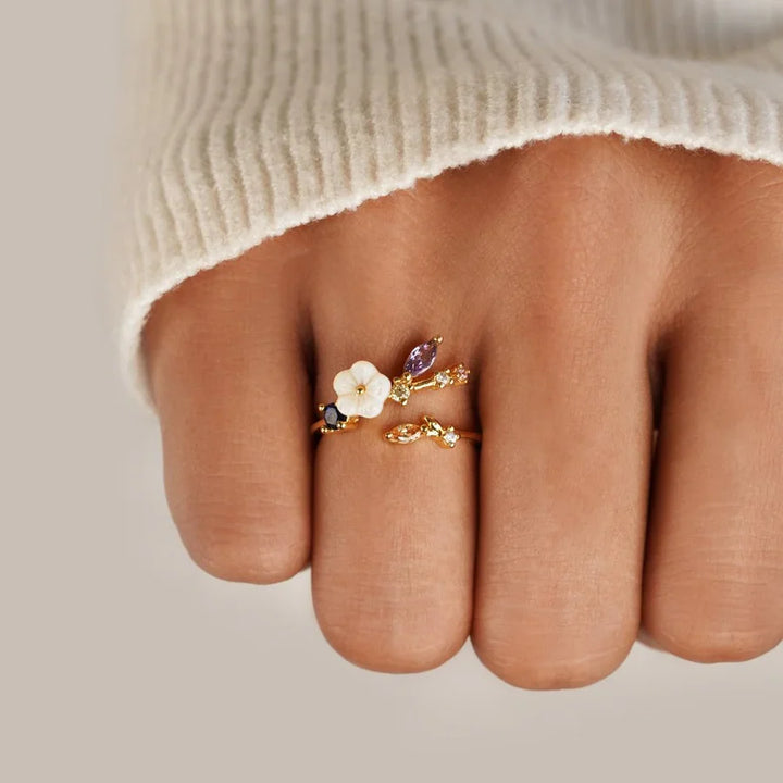 Valantomode | Plated Botanical Motif Ring with Chromatic Refractive Assets and Floral Inlay