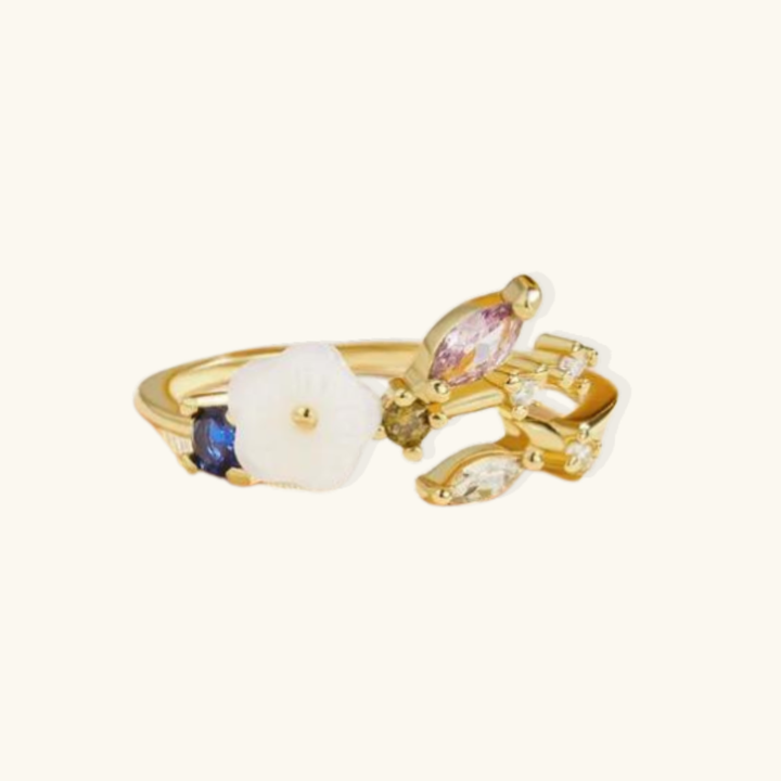Valantomode | Plated Botanical Motif Ring with Chromatic Refractive Assets and Floral Inlay