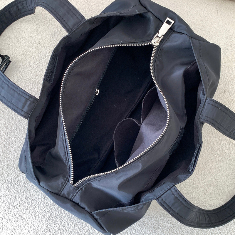 Valantomode | The Apex Nylon Transit Vessel – Women's Premium Compact Tactical Duffle