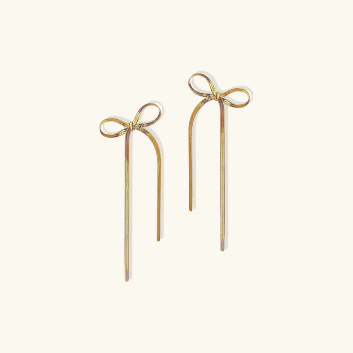 Valantomode | Plated Bow Earrings with Asymmetric Loop Architecture and Linear Geometry