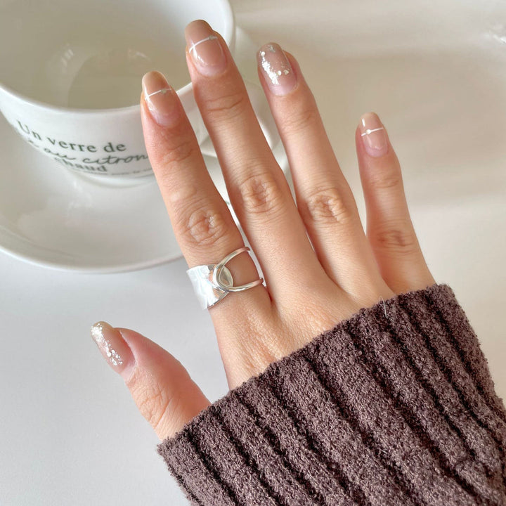 Valantomode | Plated Elise Ring with Linear-Helical Architecture and Open-Ended Geometry