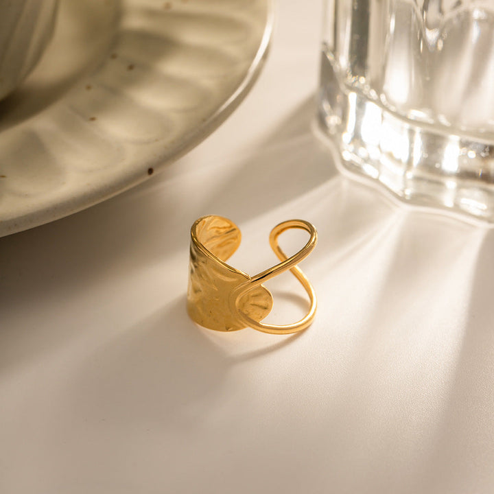 Valantomode | Plated Elise Ring with Linear-Helical Architecture and Open-Ended Geometry