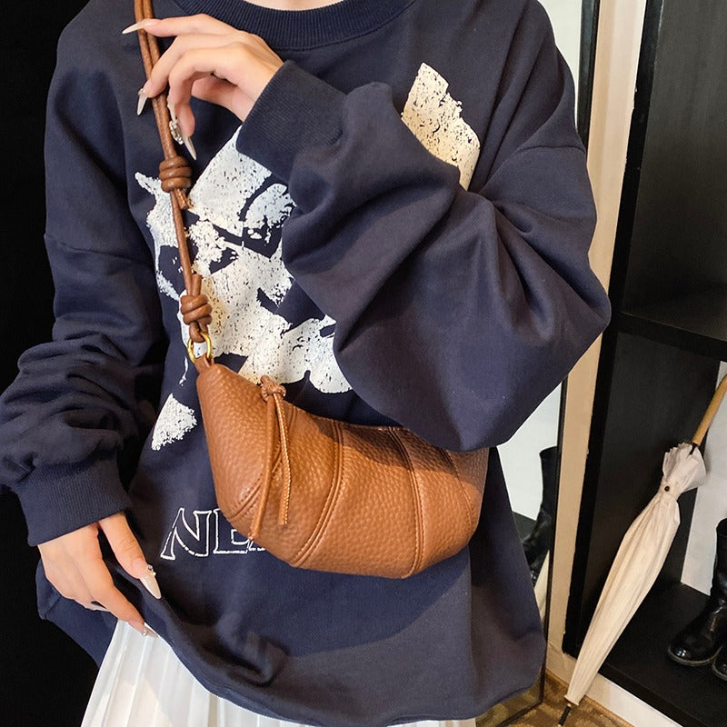 Valantomode | Aura Crescent Crossbody – Premium Vegan Leather Curved Shoulder Bag with Gold-Tone Accents