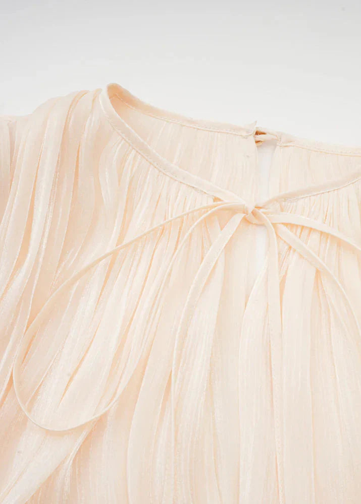 Valantomode | Chic Champagne Mini Dress with Pleats and Pearl Accents