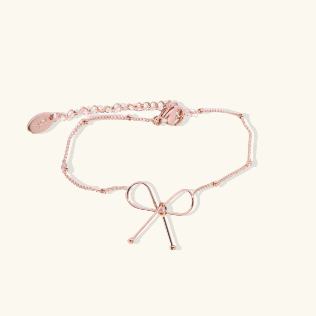 Valantomode | Plated Symmetrical Bow Bracelet with Linear Ribbon Structuralism