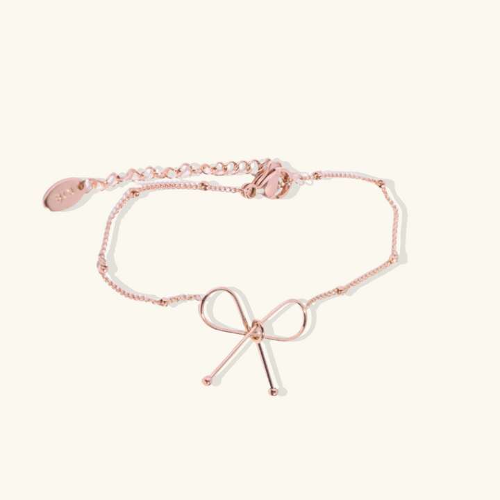Valantomode | Plated Symmetrical Bow Bracelet with Linear Ribbon Structuralism
