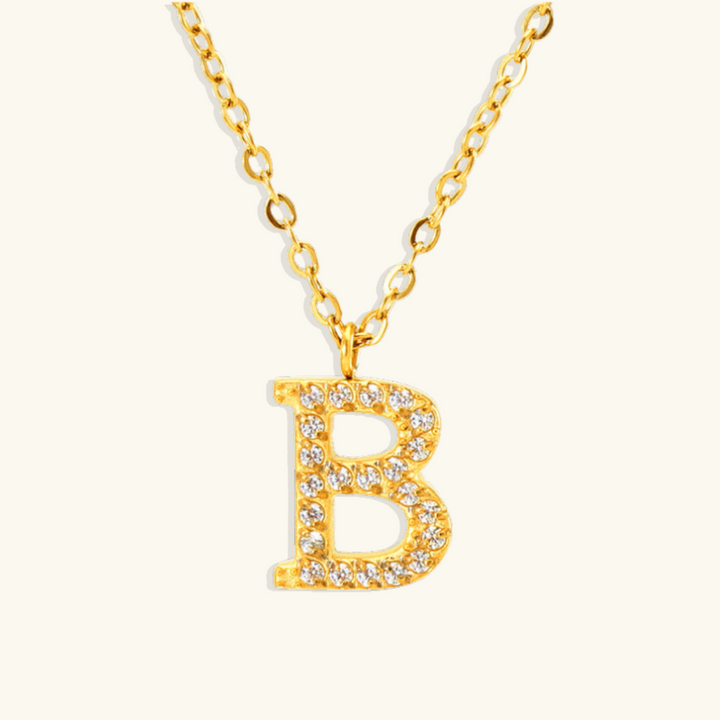 Valantomode | Plated Stainless Steel Typographic Necklace with Refractive Stone Asset