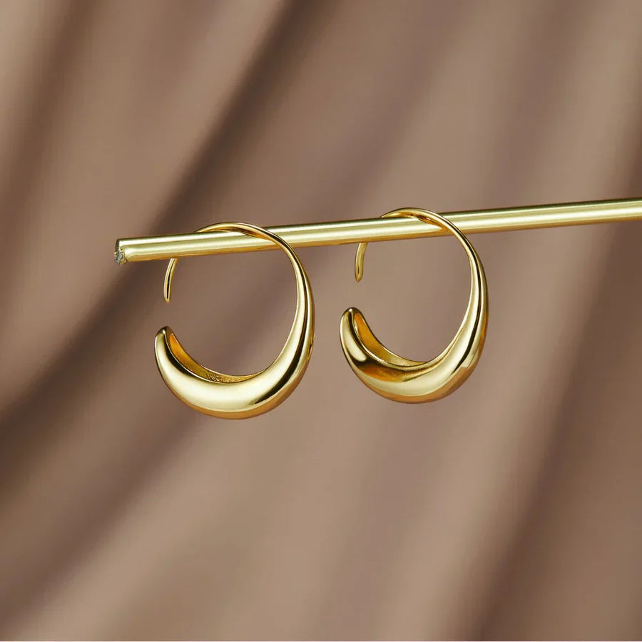 Valantomode | Plated Delilah Hoop Earrings with Crescent Volumetric Architecture and High-Mass Geometry