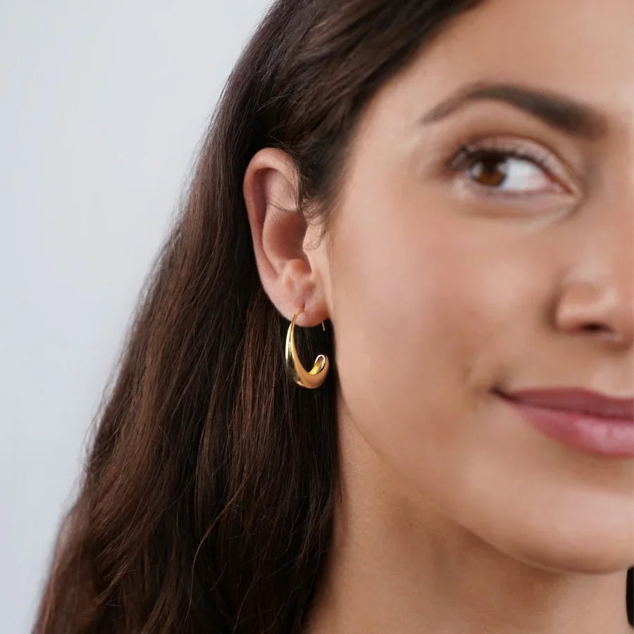 Valantomode | Plated Delilah Hoop Earrings with Crescent Volumetric Architecture and High-Mass Geometry