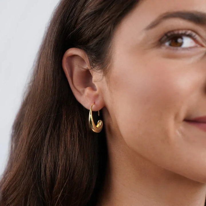 Valantomode | Plated Delilah Hoop Earrings with Crescent Volumetric Architecture and High-Mass Geometry