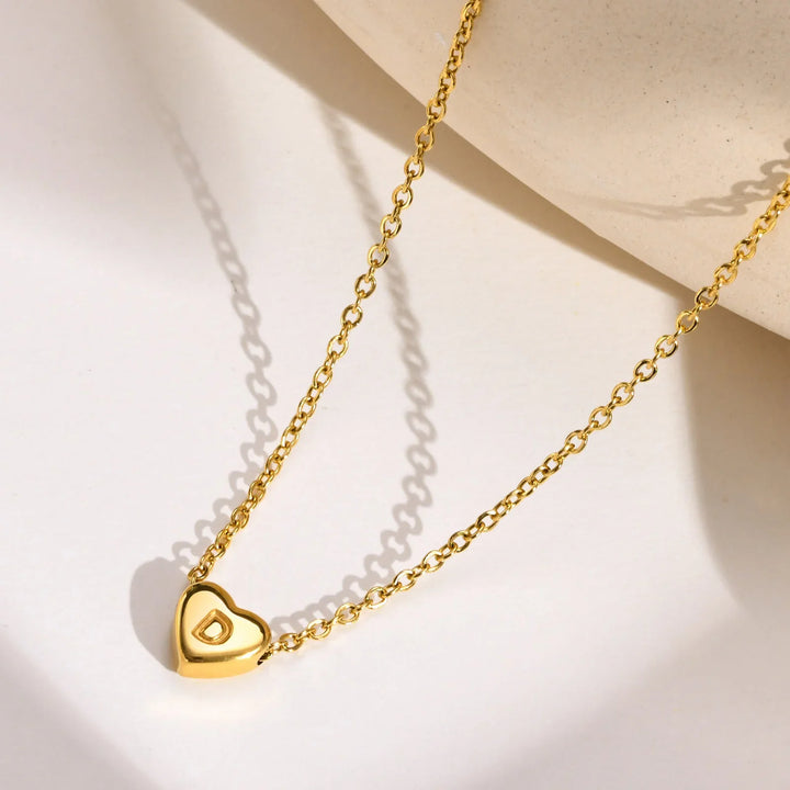 Valantomode | Plated Heart Muse Initial Necklace with Alphanumeric Cordiform Architecture