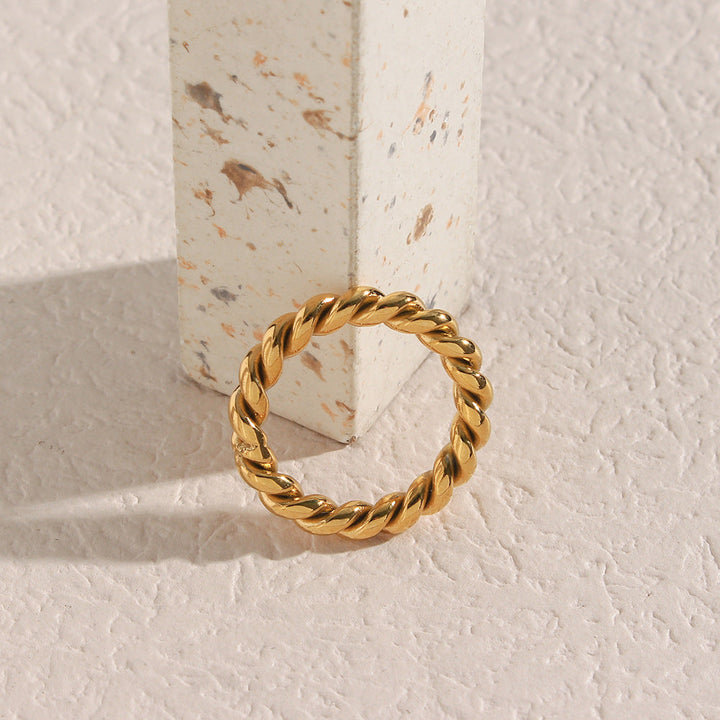 Valantomode | Plated Helical Twist Band Ring with Organic Structural Geometry
