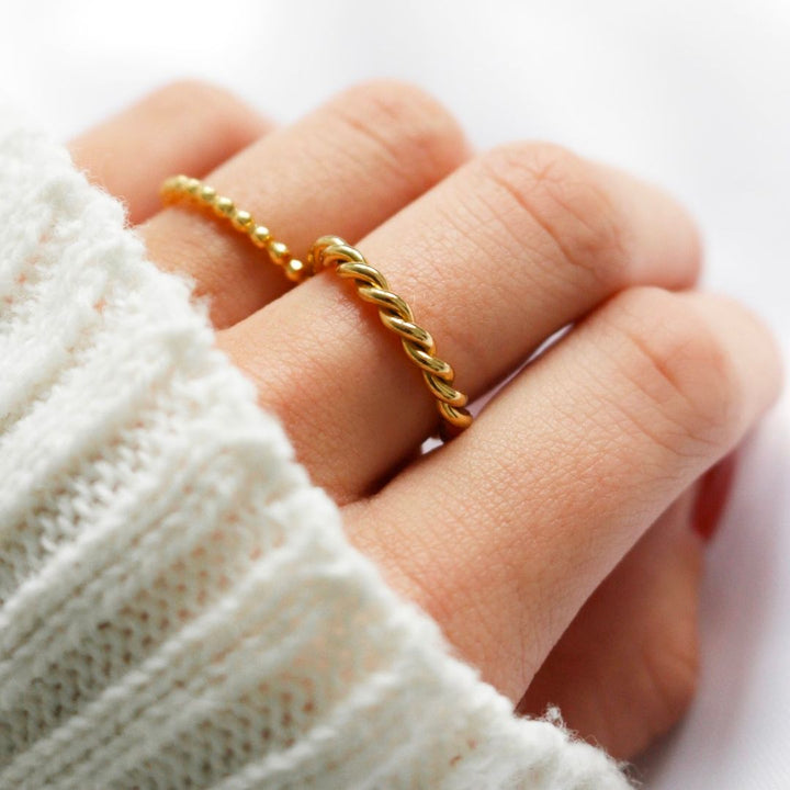 Valantomode | Plated Helical Twist Band Ring with Organic Structural Geometry