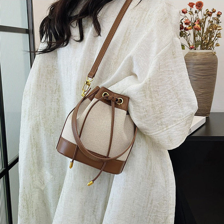 Valantomode | Odyssey Cyclus Courier – Premium Canvas & Vegan Leather Hybrid Mini Bucket Bag