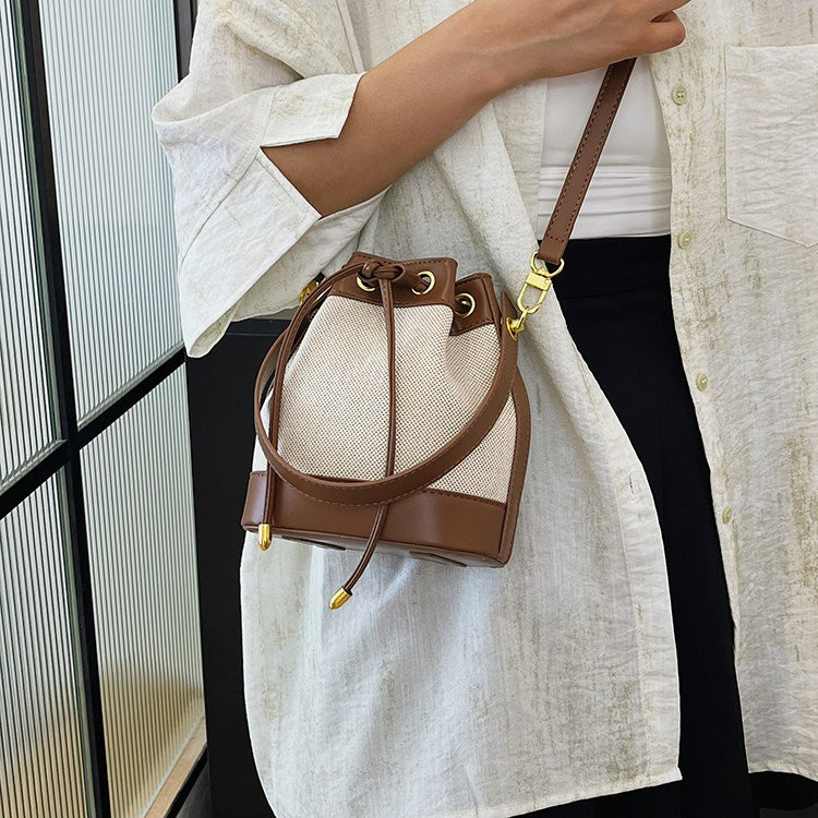 Valantomode | Odyssey Cyclus Courier – Premium Canvas & Vegan Leather Hybrid Mini Bucket Bag