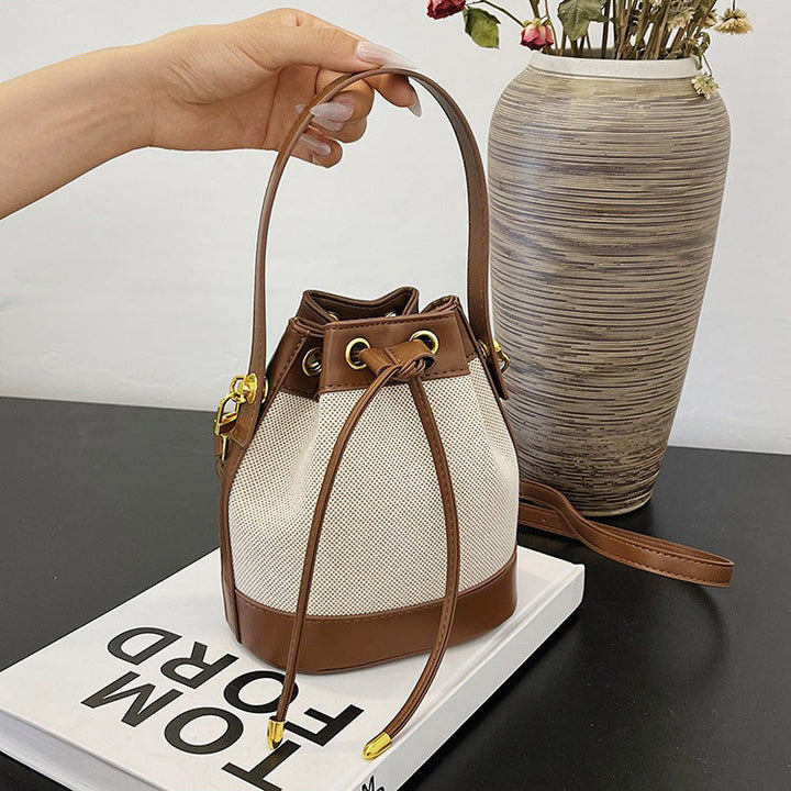 Valantomode | Odyssey Cyclus Courier – Premium Canvas & Vegan Leather Hybrid Mini Bucket Bag
