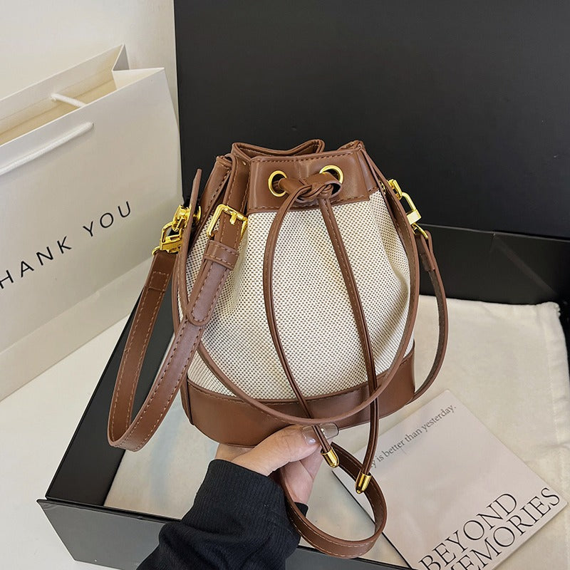 Valantomode | Odyssey Cyclus Courier – Premium Canvas & Vegan Leather Hybrid Mini Bucket Bag