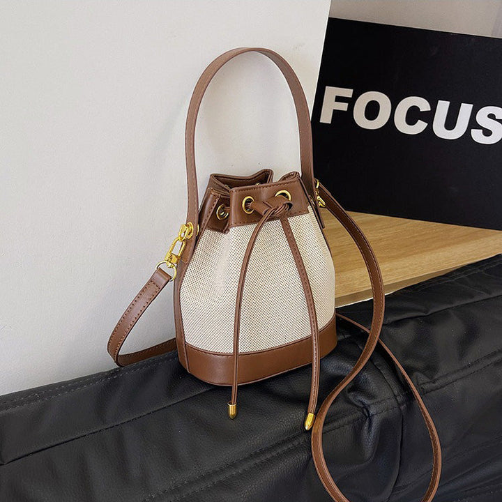 Valantomode | Odyssey Cyclus Courier – Premium Canvas & Vegan Leather Hybrid Mini Bucket Bag