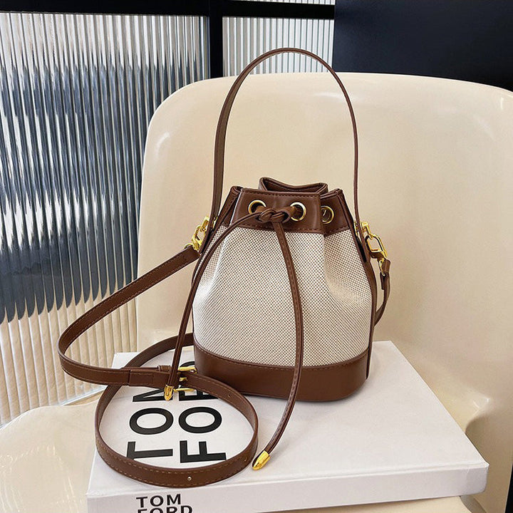 Valantomode | Odyssey Cyclus Courier – Premium Canvas & Vegan Leather Hybrid Mini Bucket Bag