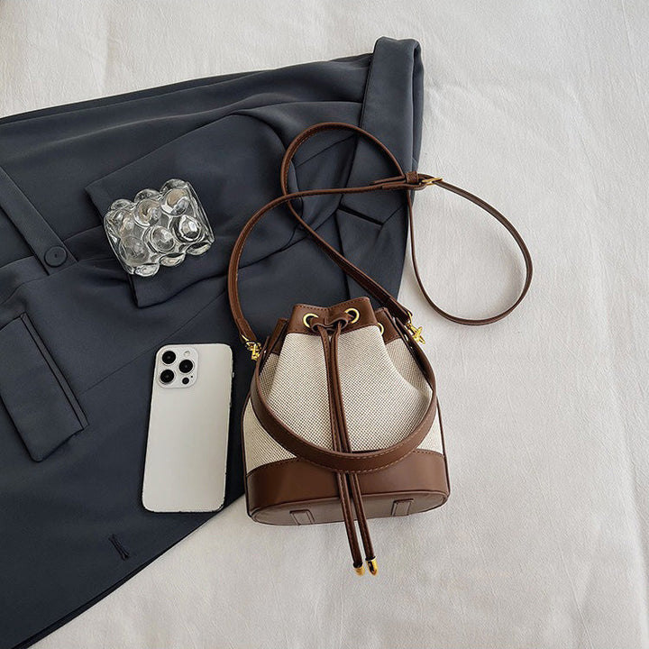 Valantomode | Odyssey Cyclus Courier – Premium Canvas & Vegan Leather Hybrid Mini Bucket Bag