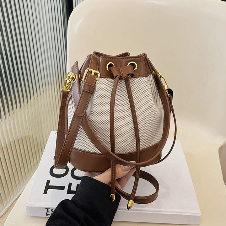 Valantomode | Odyssey Cyclus Courier – Premium Canvas & Vegan Leather Hybrid Mini Bucket Bag