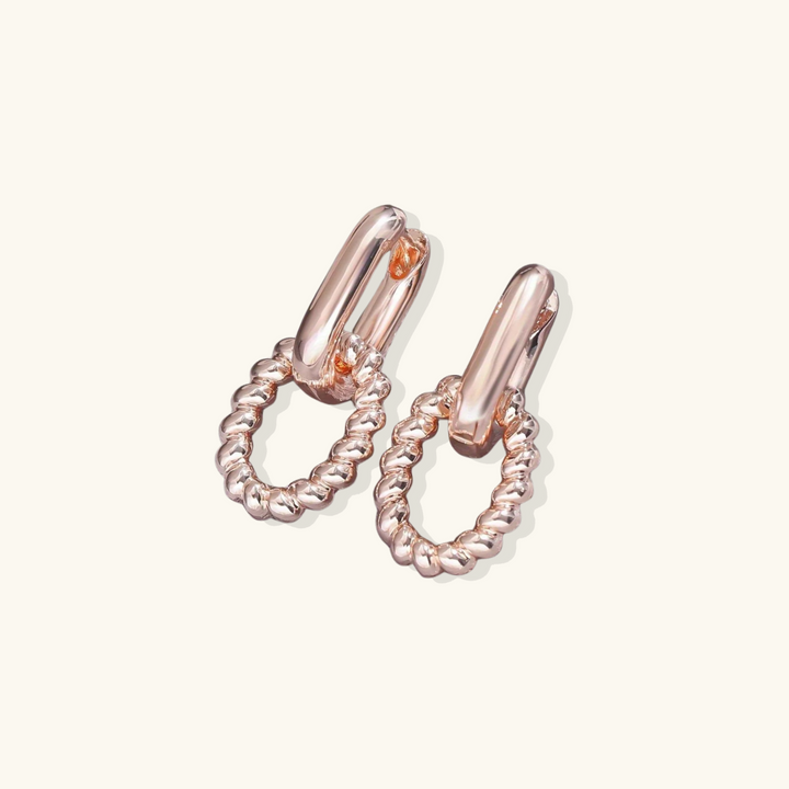 Valantomode | Plated Lauren Drop Hoop Earrings with Helical Torsion Architecture and Oval Geometry
