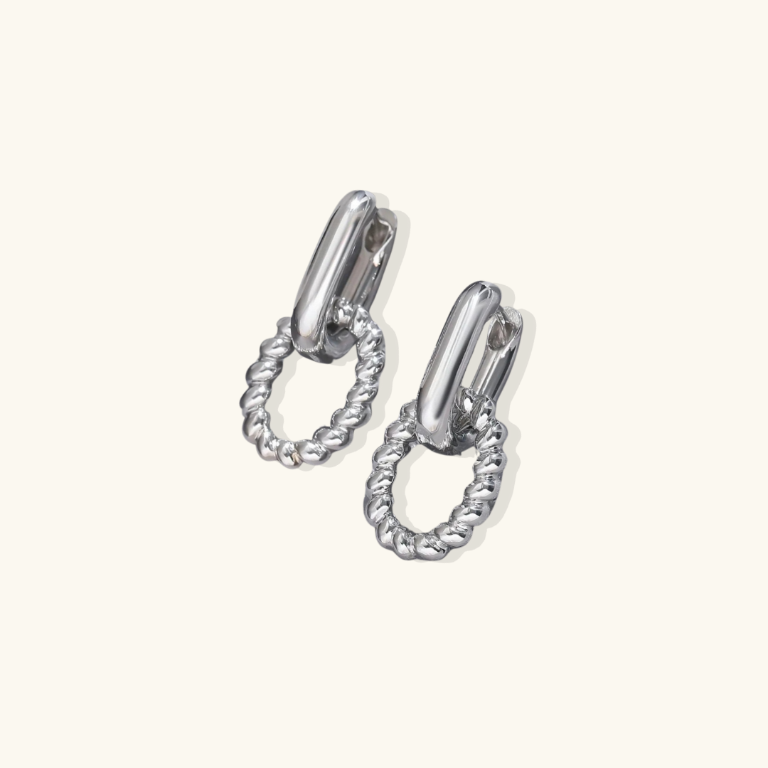 Valantomode | Plated Lauren Drop Hoop Earrings with Helical Torsion Architecture and Oval Geometry