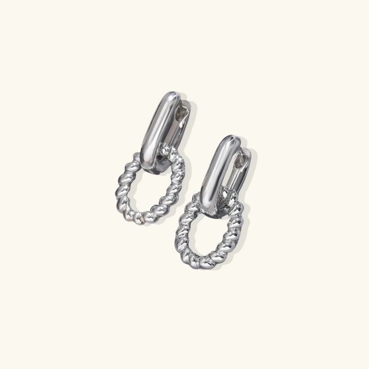 Valantomode | Plated Lauren Drop Hoop Earrings with Helical Torsion Architecture and Oval Geometry