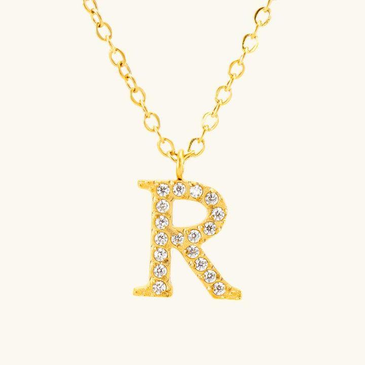Valantomode | Plated Stainless Steel Typographic Necklace with Refractive Stone Asset
