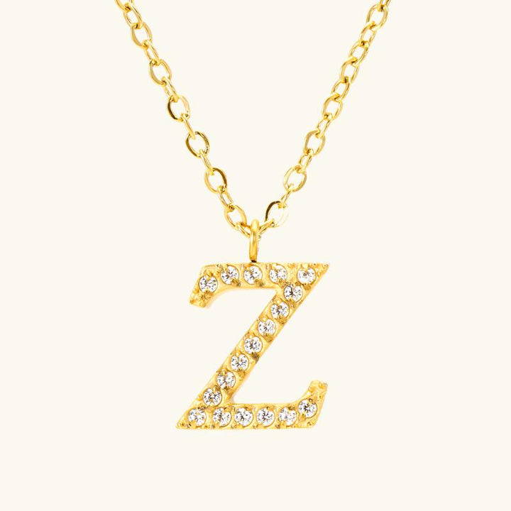 Valantomode | Plated Stainless Steel Typographic Necklace with Refractive Stone Asset