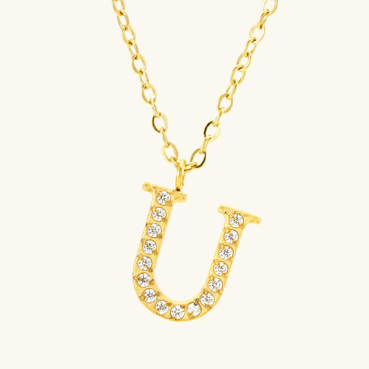 Valantomode | Plated Stainless Steel Typographic Necklace with Refractive Stone Asset